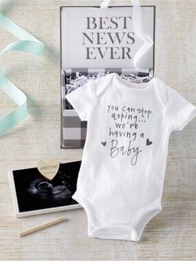 Mud Pie White Baby Announcement Onesie - "We're Having a Baby"